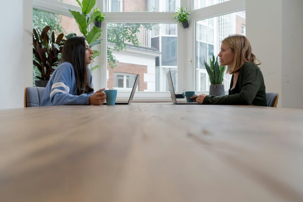 One-on-one meeting in an office.